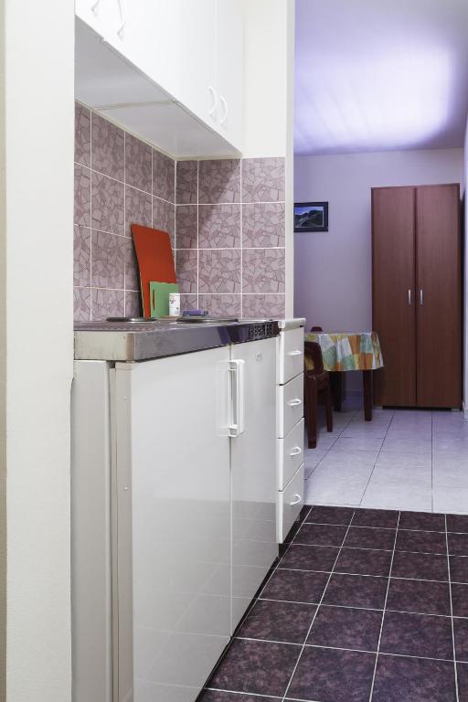 Kuchyň nebo kuchyňský kout v ubytování Villa Dionis