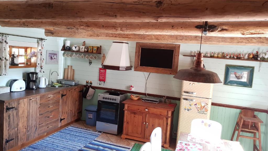 Kuchyň nebo kuchyňský kout v ubytování Männi Summerhouse