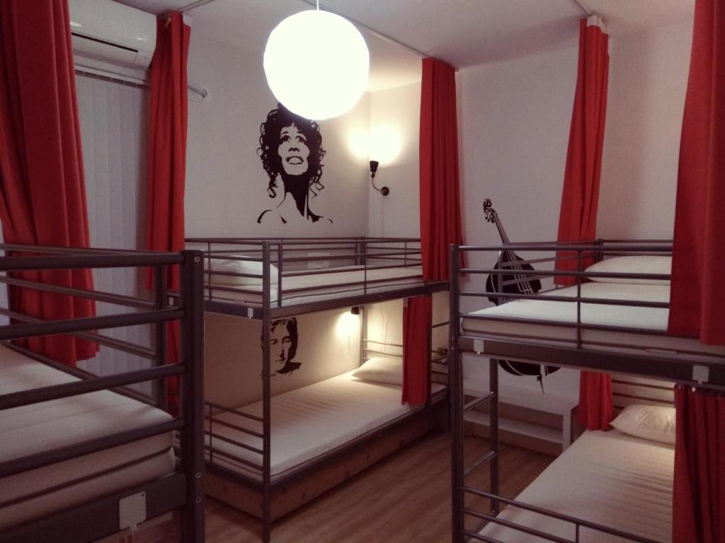 Postel nebo postele na pokoji v ubytování Pijama Hostel