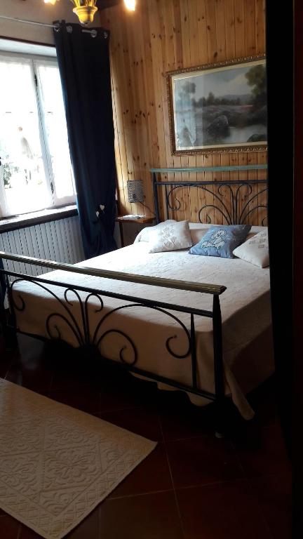Postel nebo postele na pokoji v ubytování "LA TAVERNA" B&B