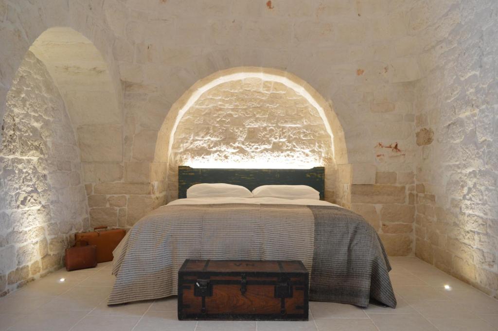 Posteľ alebo postele v izbe v ubytovaní Masseria Faraone