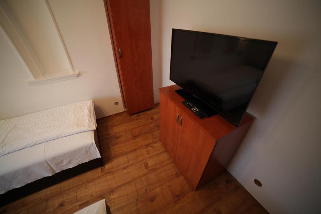 Telewizja i/lub zestaw kina domowego w obiekcie Eged Vendégház
