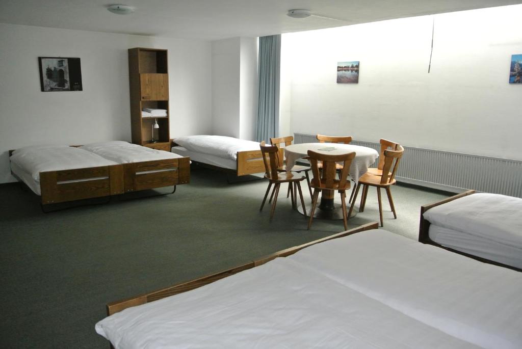 Voodi või voodid majutusasutuse Hostel Casa Franco toas