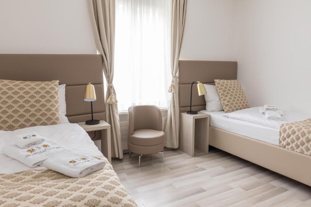 Postel nebo postele na pokoji v ubytování Residence Mutschellen