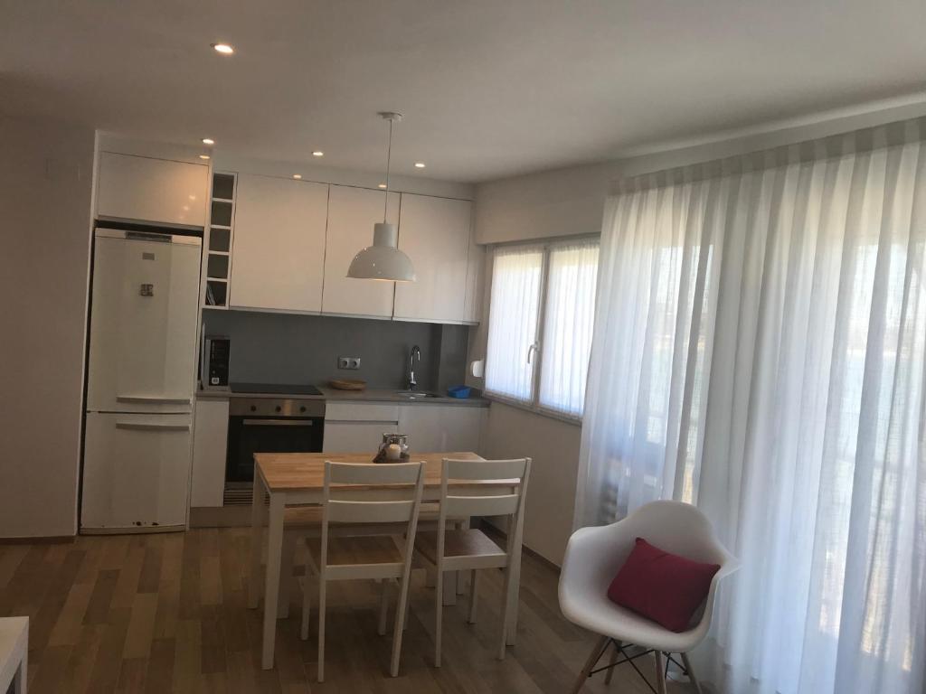 Kuchyň nebo kuchyňský kout v ubytování Apartamento frente al mar
