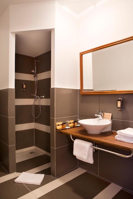 Koupelna v ubytování ROSS Hotel