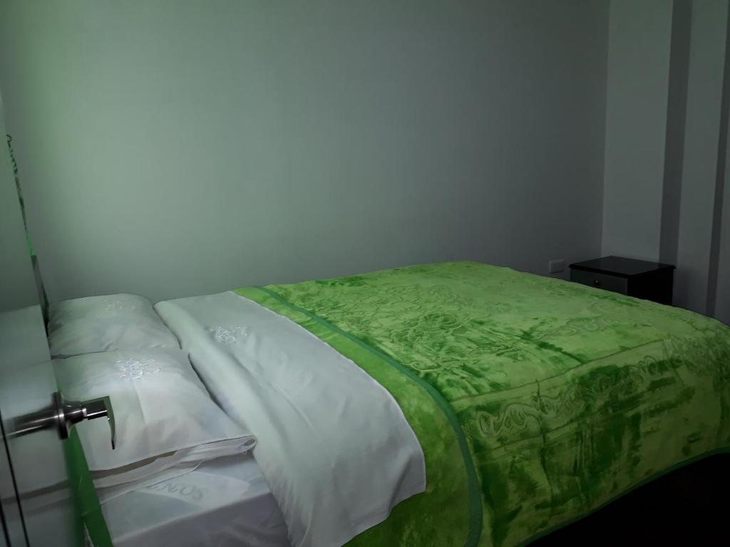 Postel nebo postele na pokoji v ubytování Hotel Royal Class