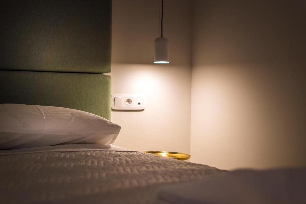 Posteľ alebo postele v izbe v ubytovaní Allure Central Boutique Hotel