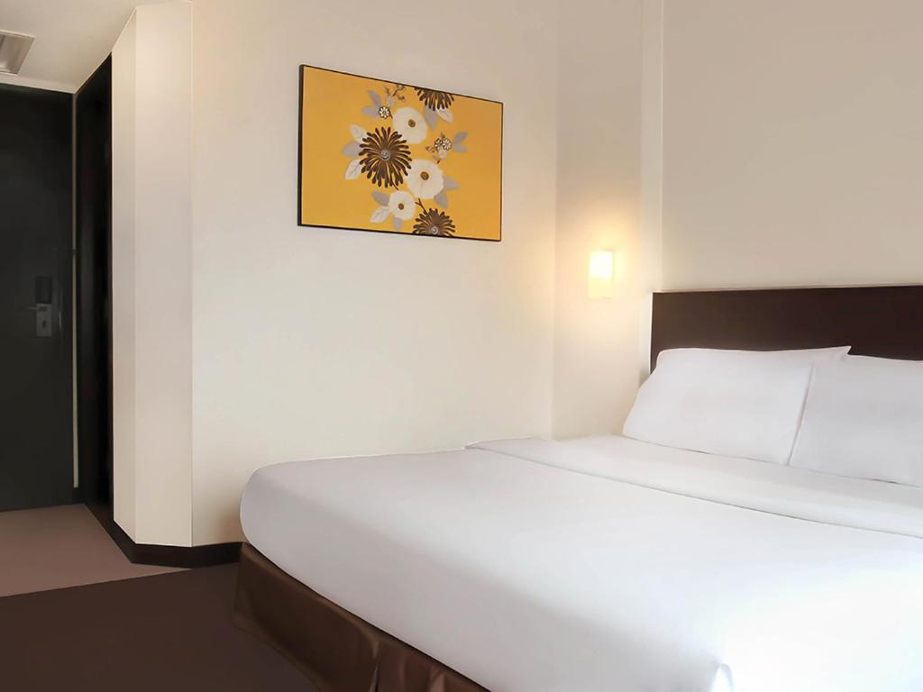 Postel nebo postele na pokoji v ubytování Hotel Summer View