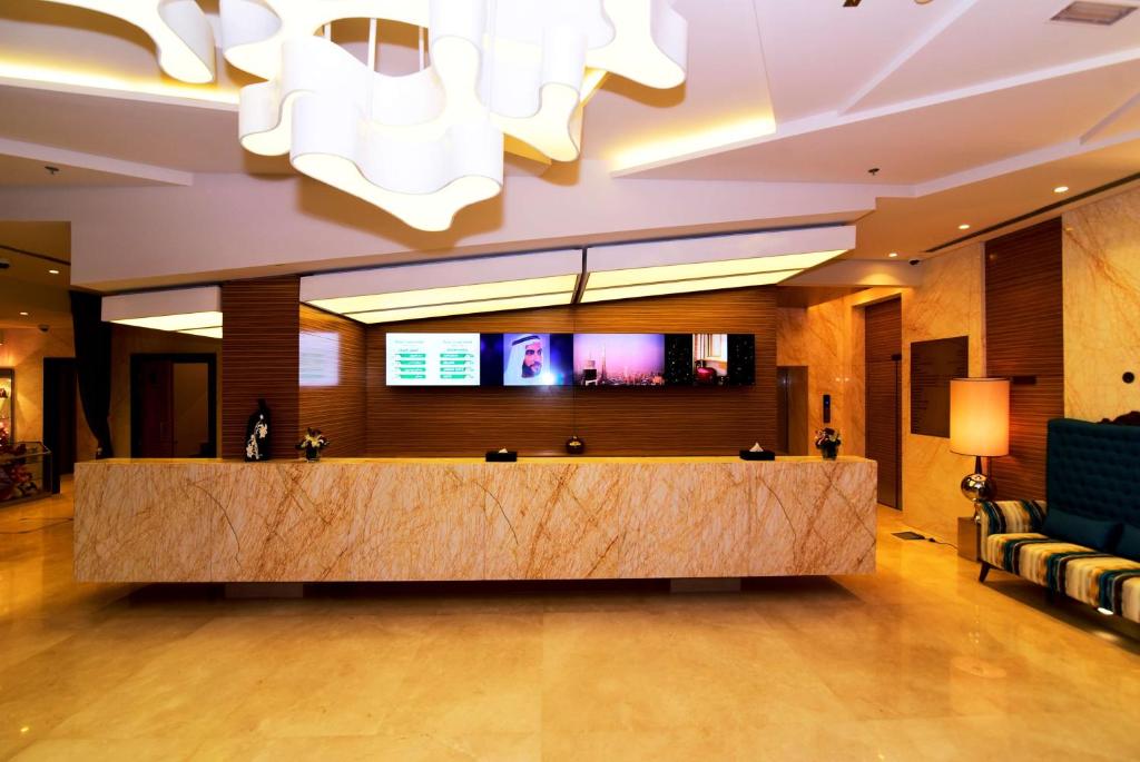 TV a/nebo společenská místnost v ubytování Best Western Plus Pearl Creek