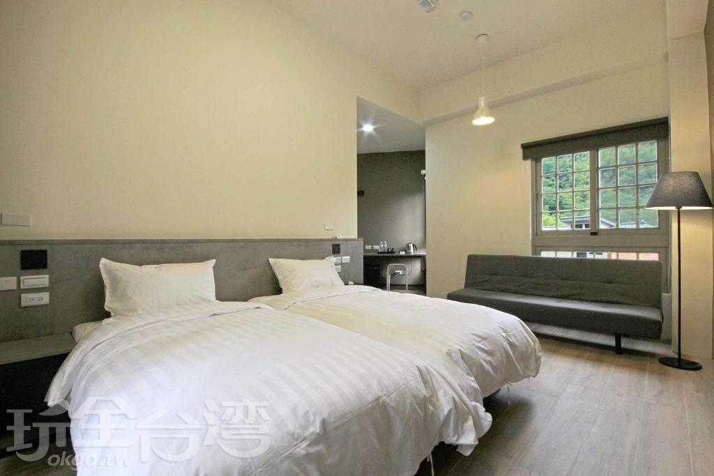 Postel nebo postele na pokoji v ubytování Sitou ARCADIA Homestay
