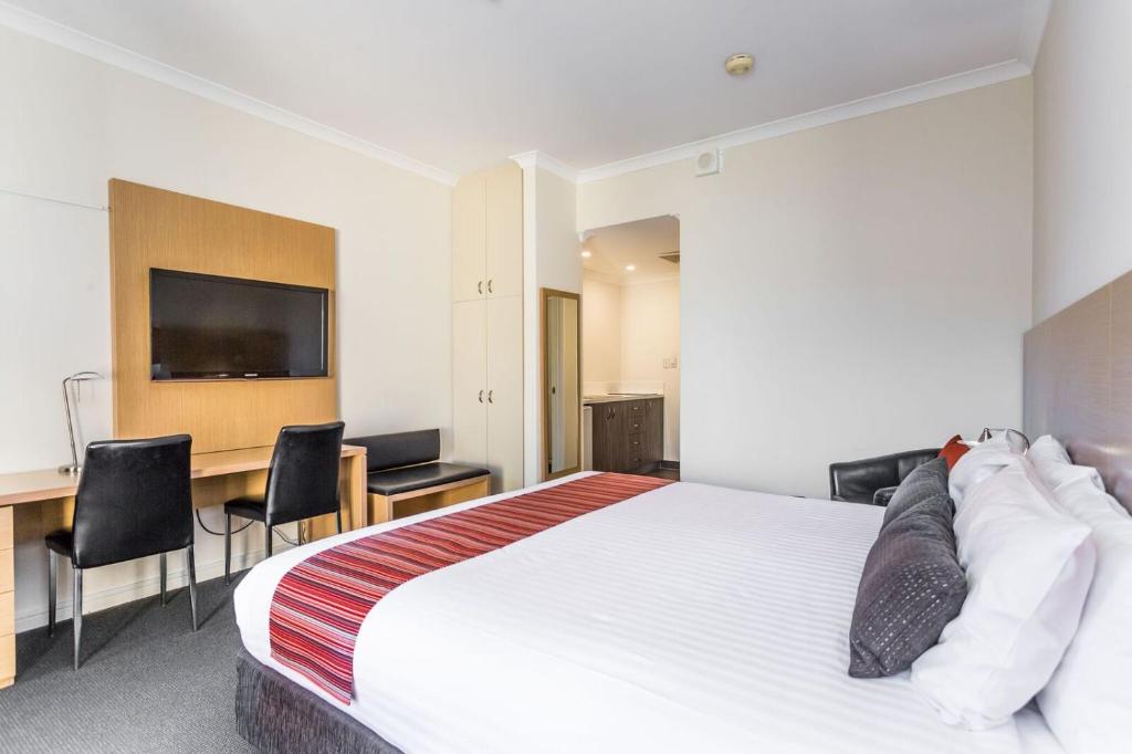 Ein Bett oder Betten in einem Zimmer der Unterkunft Country Comfort Perth
