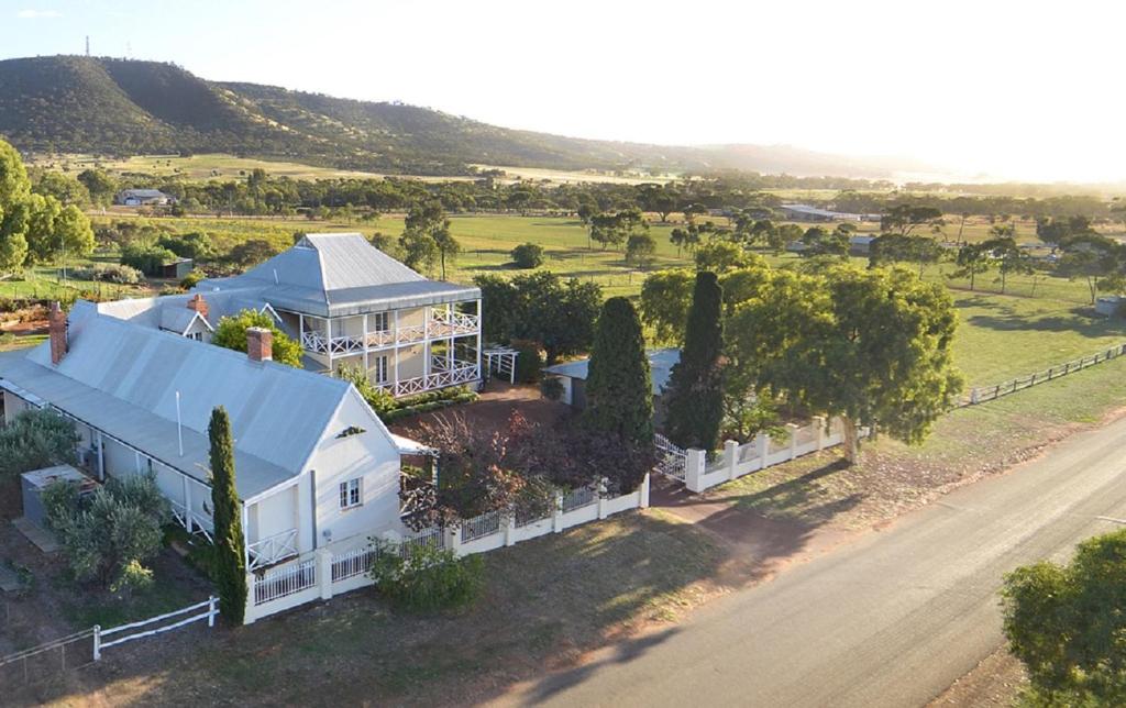 an aerial view of a large white house at Hope Farm Guesthouse in York