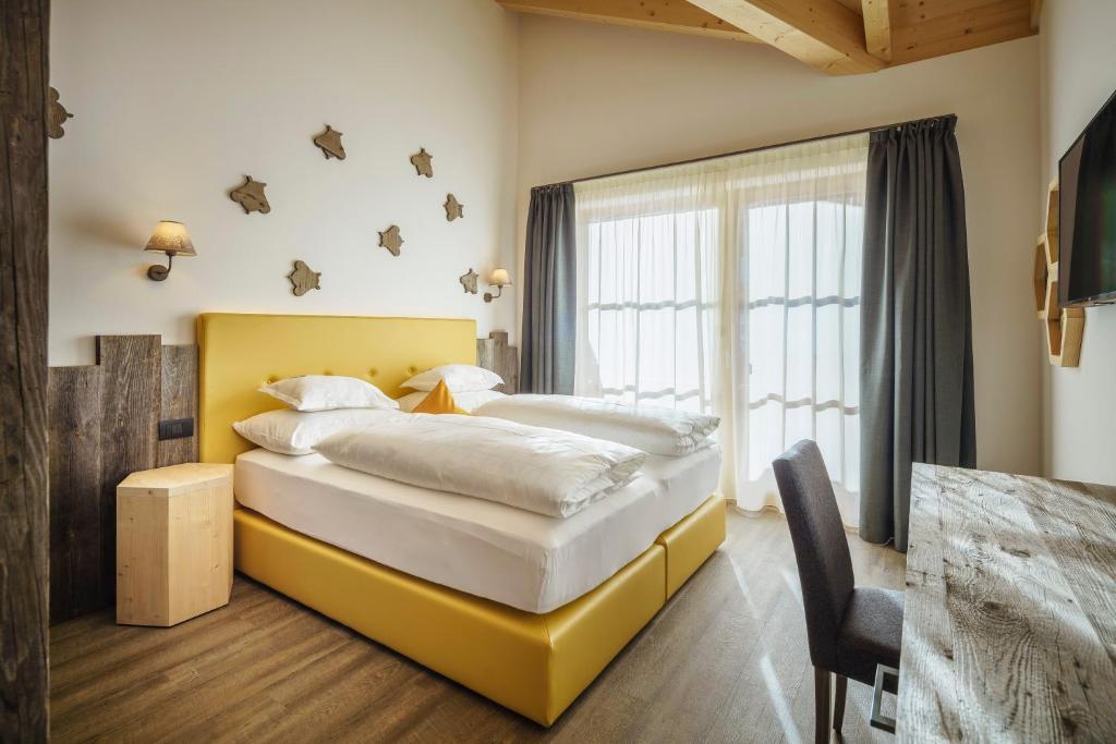 Postel nebo postele na pokoji v ubytování Plang Farmhouse
