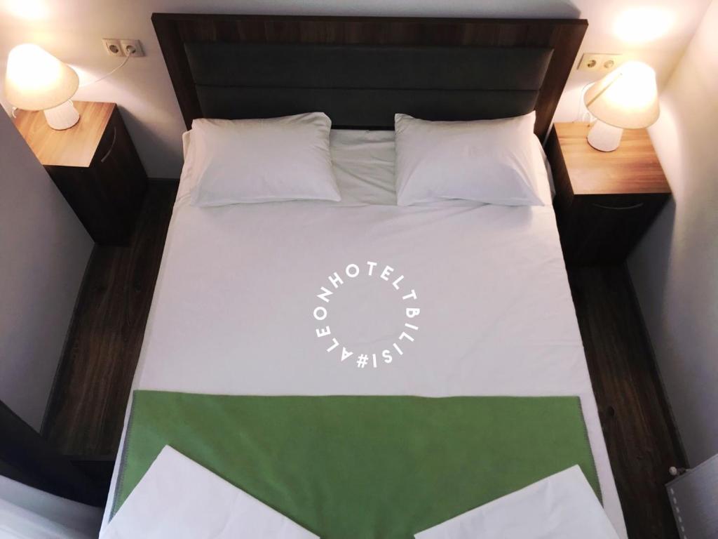 Postel nebo postele na pokoji v ubytování Aleon Hotel