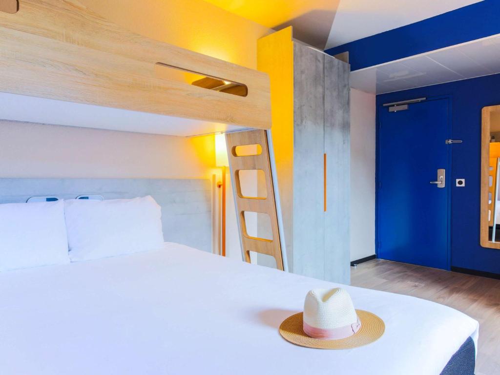 Llit o llits en una habitació de Ibis Budget Albi Centre