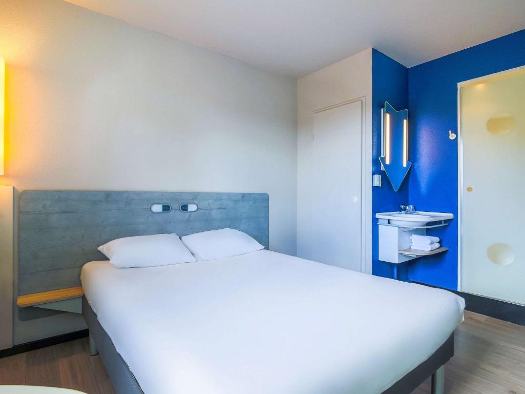 Llit o llits en una habitació de Ibis Budget Albi Centre