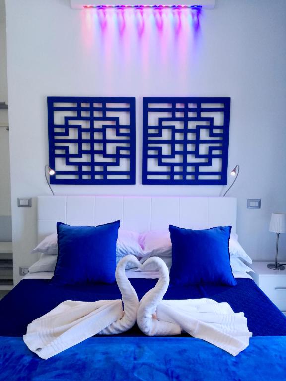 Postel nebo postele na pokoji v ubytování MaLu' B&B