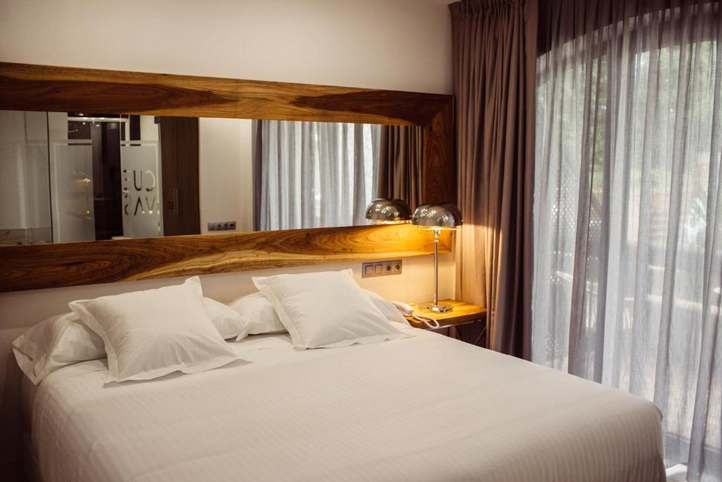 Postel nebo postele na pokoji v ubytování Hotel Cuevas - Adults Only