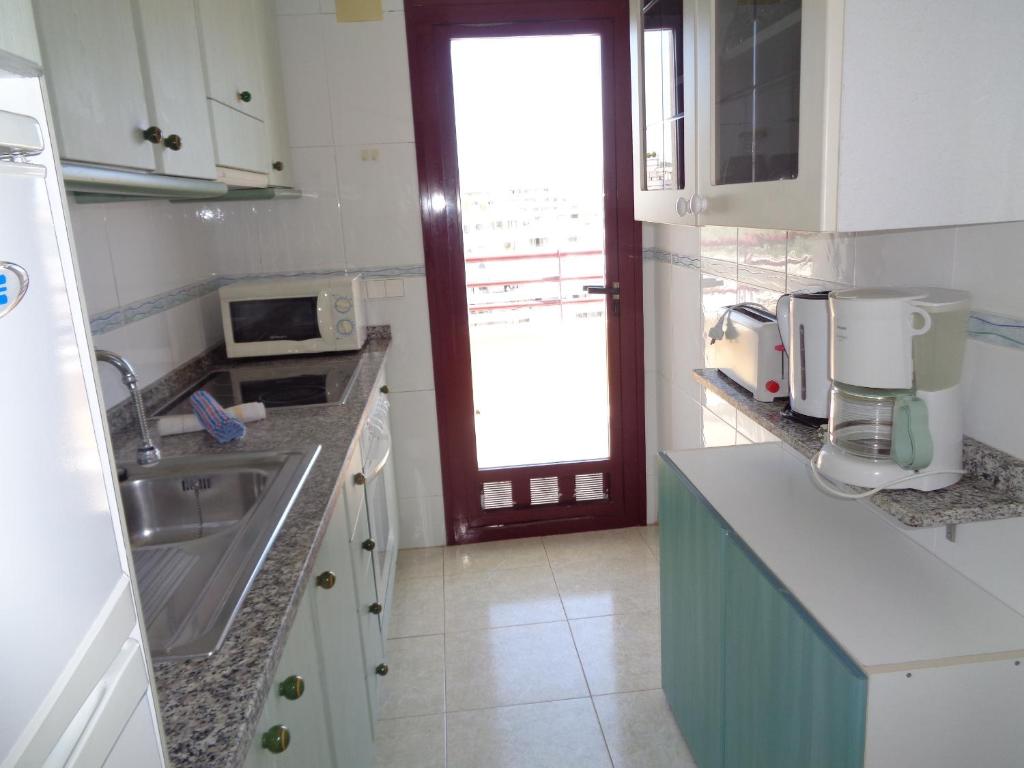 Kuchyň nebo kuchyňský kout v ubytování Edificio Zafiro