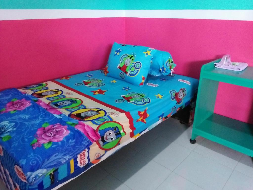 Postel nebo postele na pokoji v ubytování Homestay Lidiya