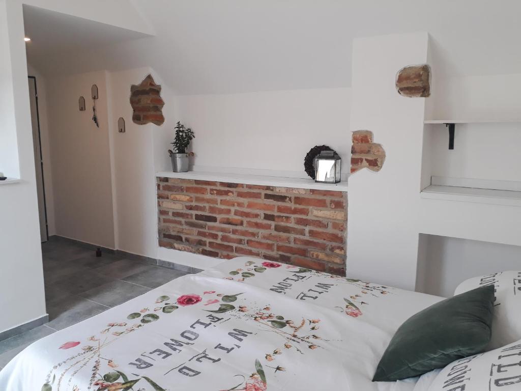 Postel nebo postele na pokoji v ubytování Statek u kapličky