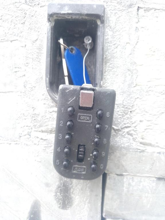 a remote control is attached to a wall at Apartamentos turísticos Vistademar in Luarca