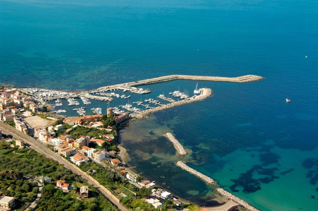 an aerial view of a harbor with boats in the water at B&B A' NASSA in Trabia