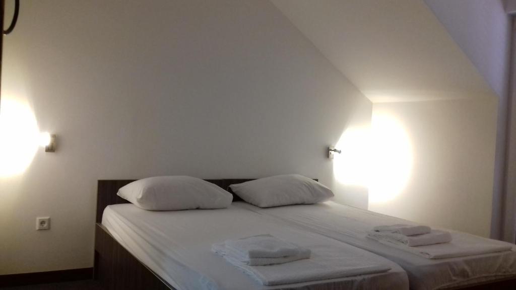 Postel nebo postele na pokoji v ubytování Guest House Babić