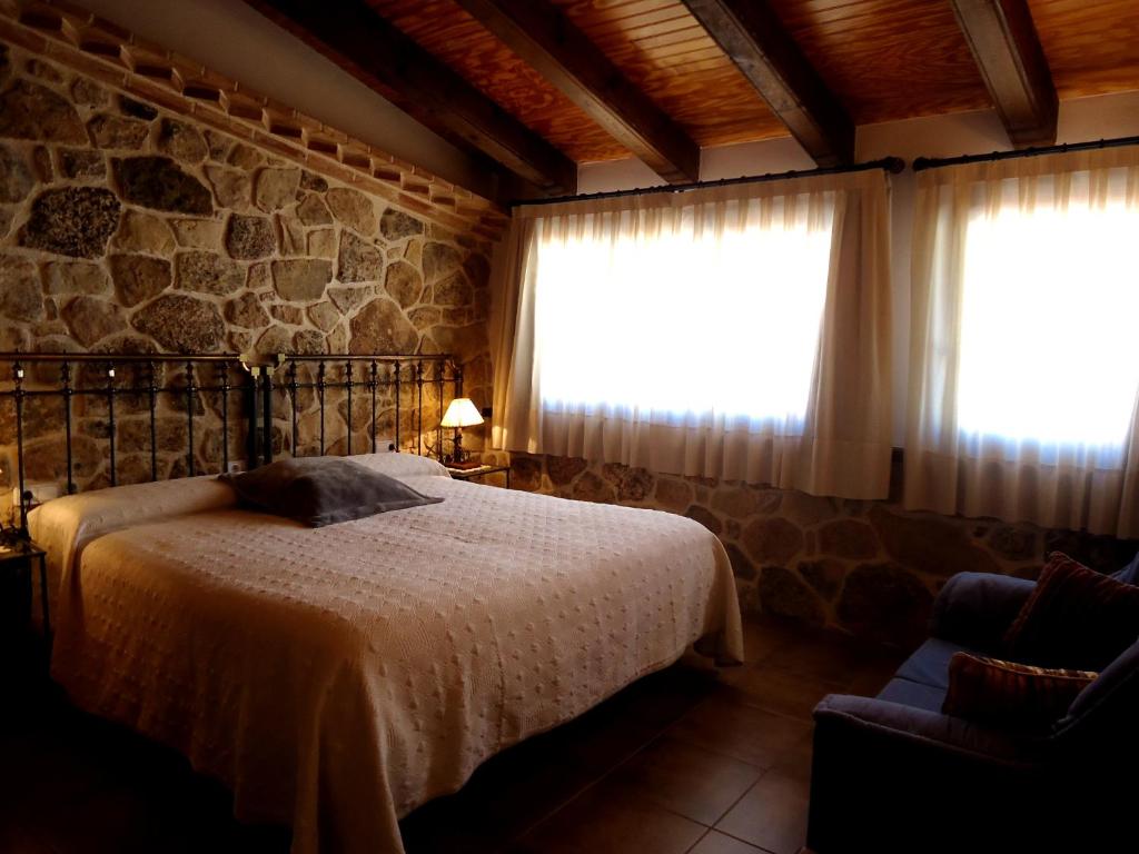 Krevet ili kreveti u jedinici u objektu Hostal Casa Laure y Mª Jose