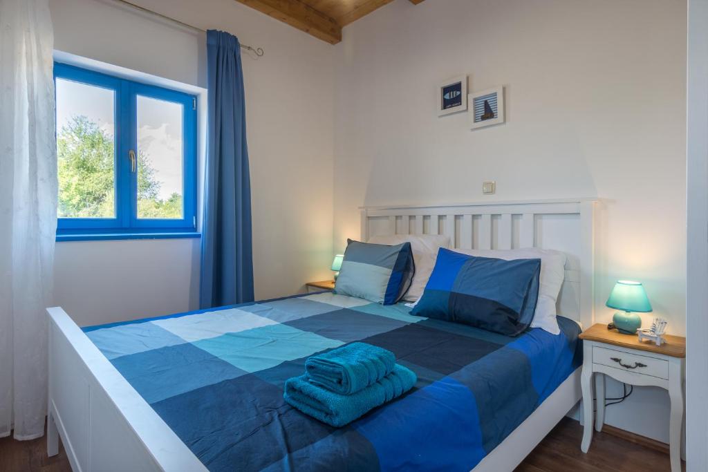 Postel nebo postele na pokoji v ubytování Tiny house