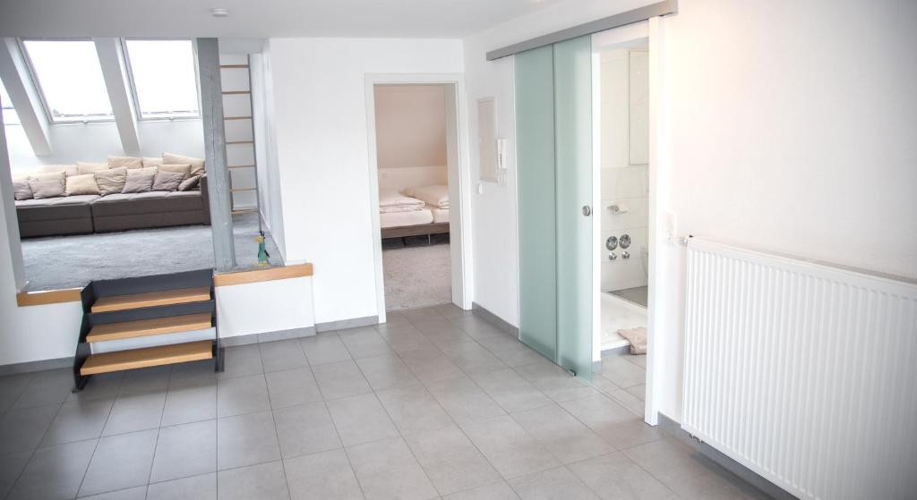 Postel nebo postele na pokoji v ubytování Kragemann Hotel & Vinothek