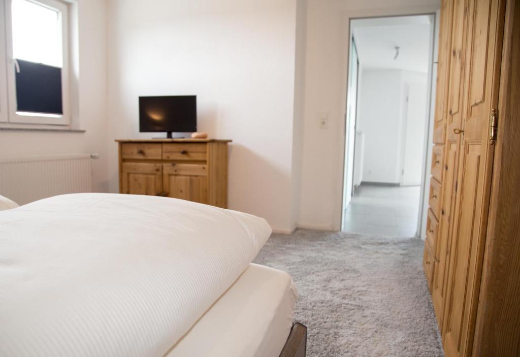 TV a/nebo společenská místnost v ubytování Kragemann Hotel & Vinothek