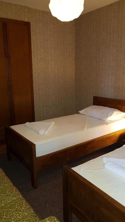 Postel nebo postele na pokoji v ubytování Guesthouse Galimar