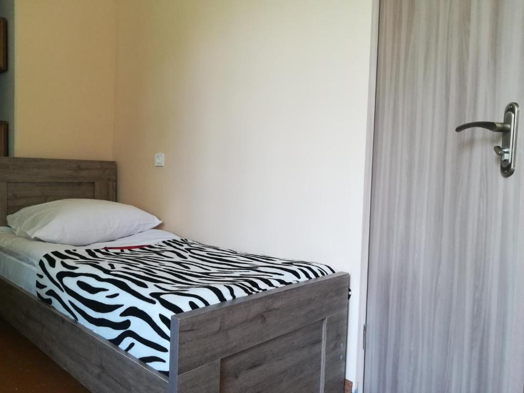 Postel nebo postele na pokoji v ubytování Guest House Carpediem
