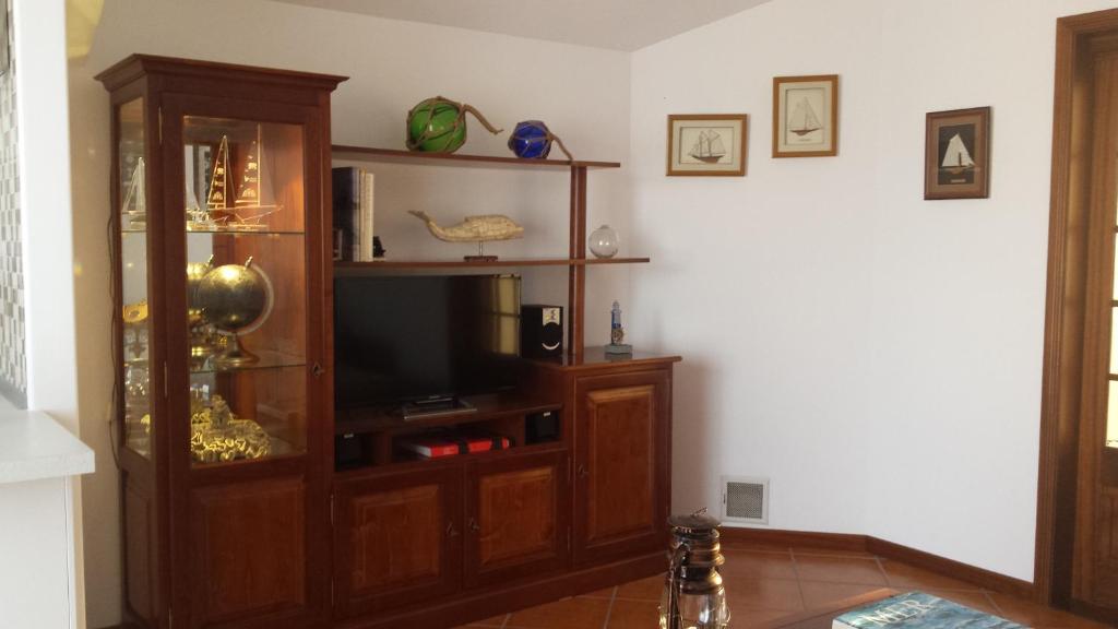 TV a/nebo společenská místnost v ubytování Vista do Canal Plus