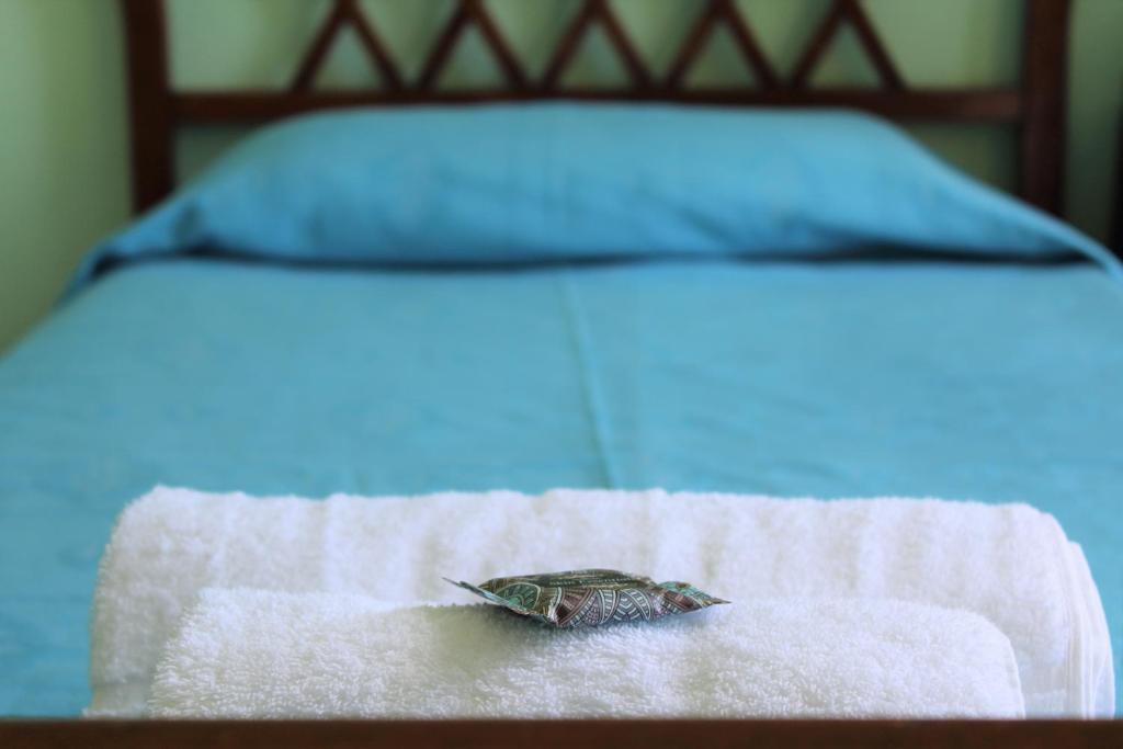 Postel nebo postele na pokoji v ubytování Nireus Hotel