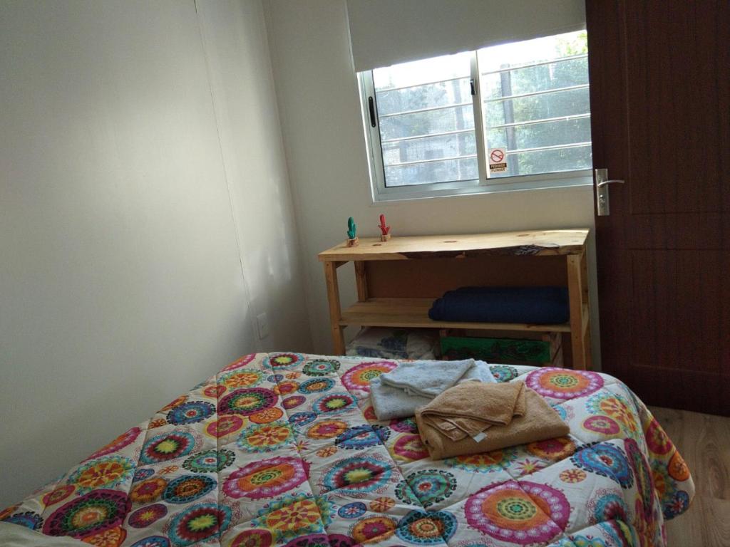 Ein Bett oder Betten in einem Zimmer der Unterkunft Limón y Sal