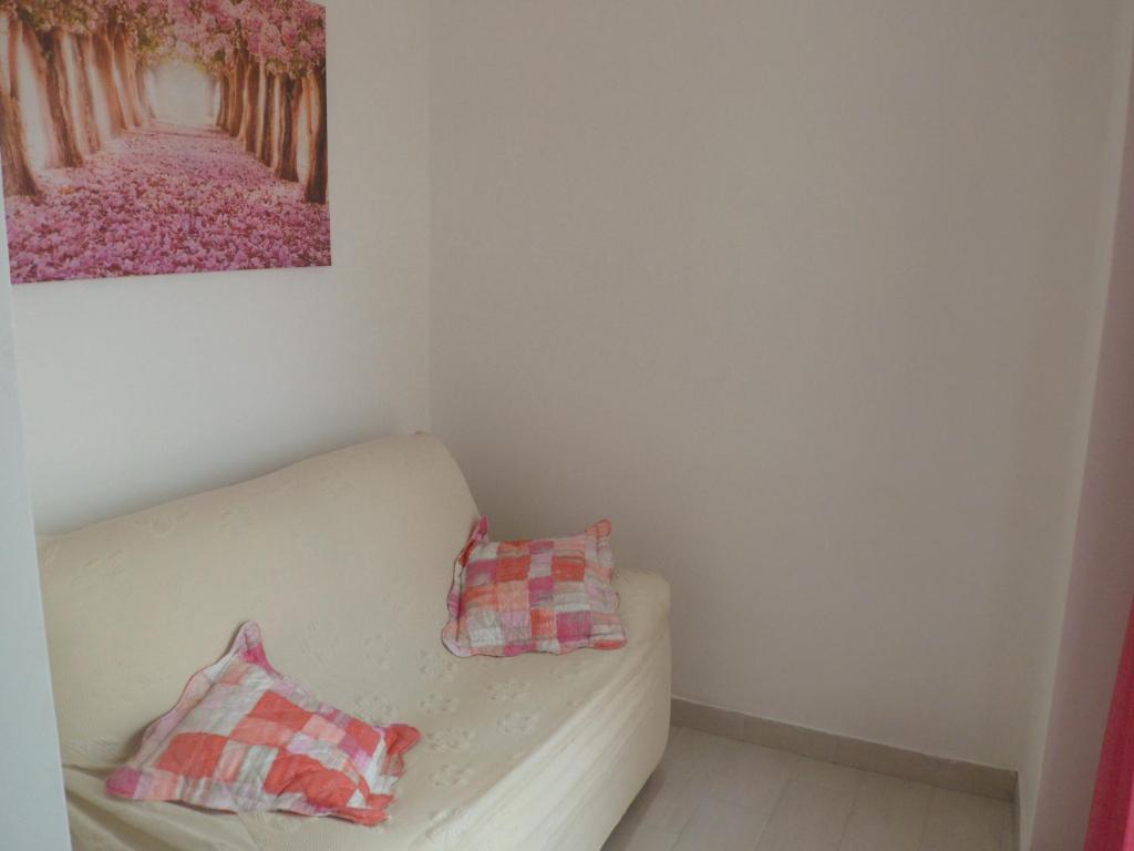 A bed or beds in a room at casa vacanze"IL TRAMONTO"