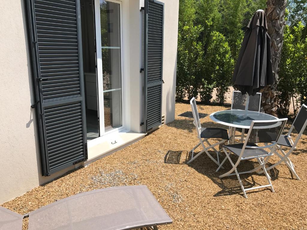 Patio nebo venkovní prostory v ubytování Windward