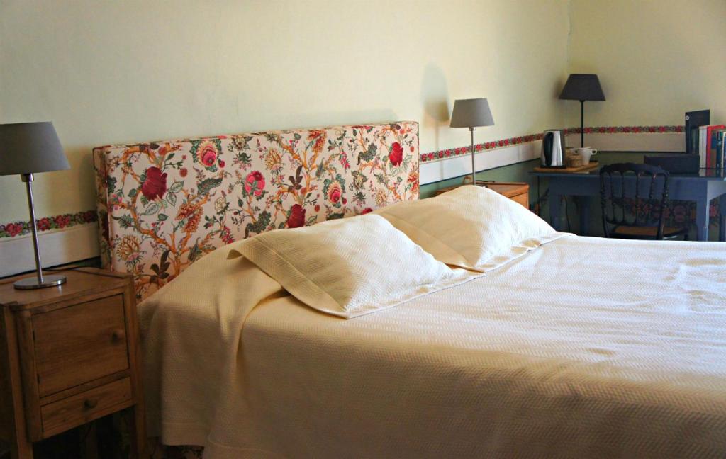 Postel nebo postele na pokoji v ubytování Casa de Sezim