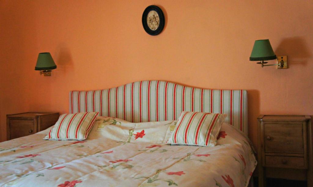 Postel nebo postele na pokoji v ubytování Casa de Sezim
