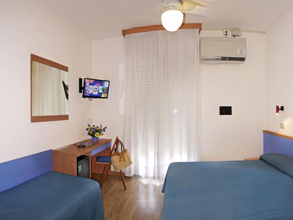 TV a/nebo společenská místnost v ubytování Hotel Bertha Fronte Mare
