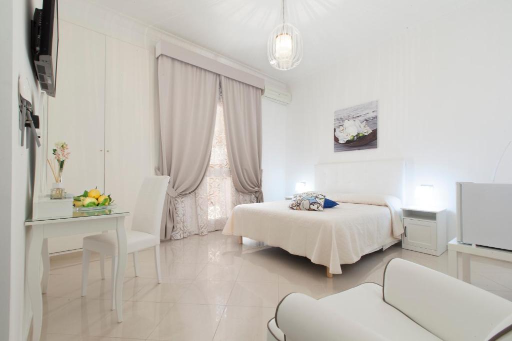 Posteľ alebo postele v izbe v ubytovaní San Nicola B&B