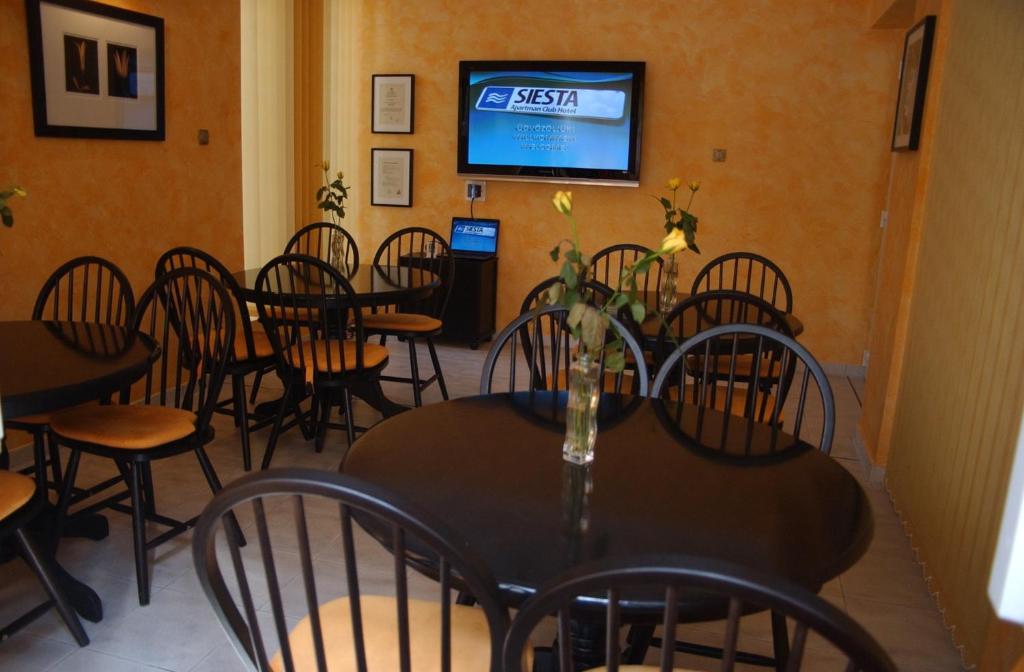 TV a/nebo společenská místnost v ubytování Siesta Club Apartman Harkány