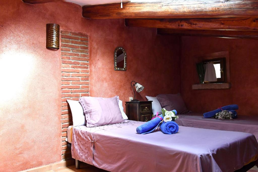 Postel nebo postele na pokoji v ubytování Mas Valoria