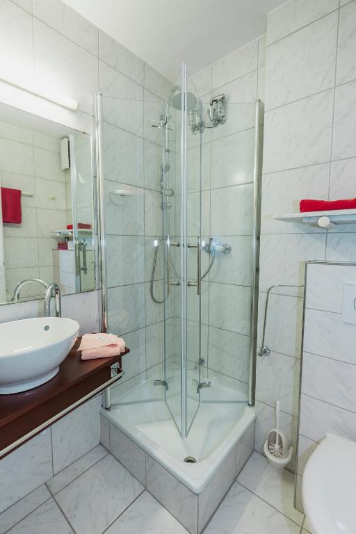 Koupelna v ubytování Hotel Excelsior