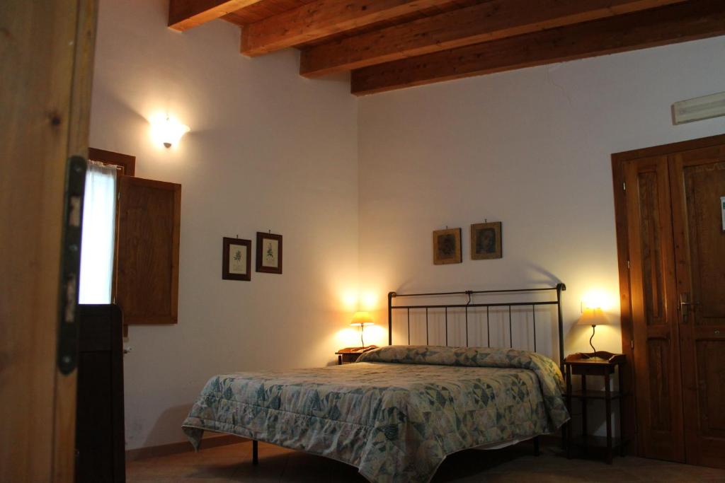 Postel nebo postele na pokoji v ubytování La Mandra