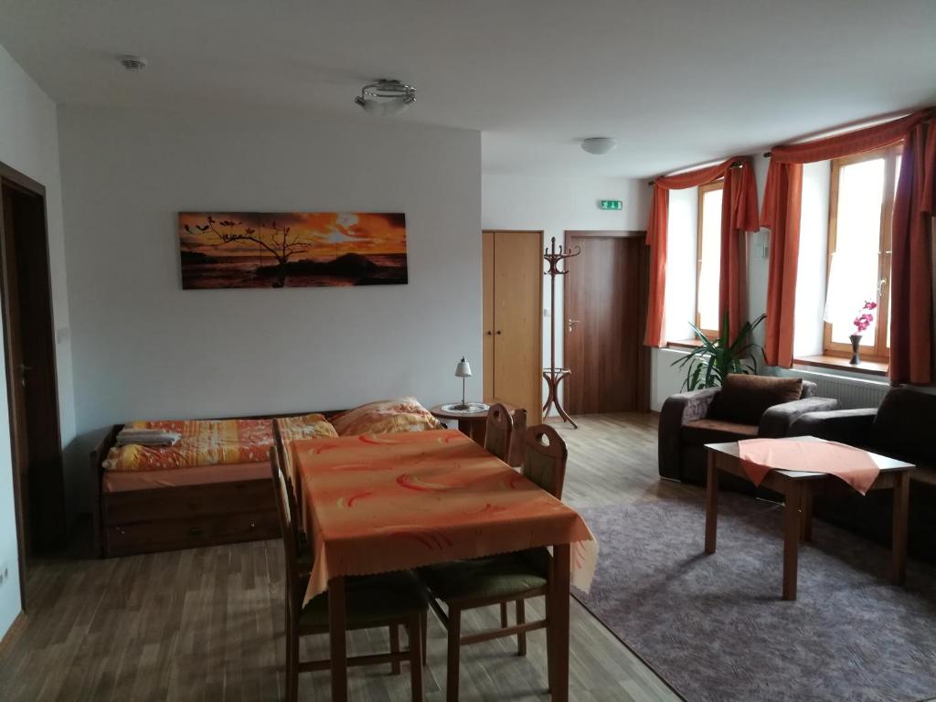 Postel nebo postele na pokoji v ubytování Penzion Pod Zámkem