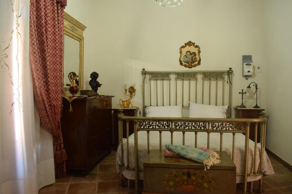 A bed or beds in a room at B&b Lemon Garden